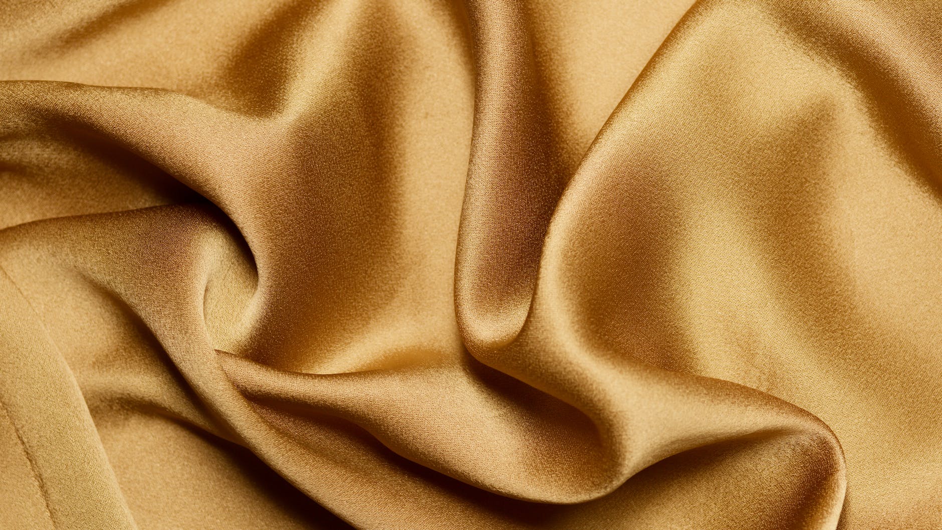 close up shot of a gold textile